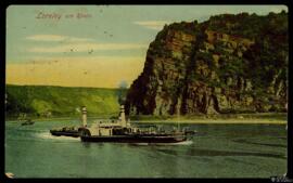 Tarjeta postal a color de un barco de vapor junto al risco Lorelei remitida a la familia Harry Ro...
